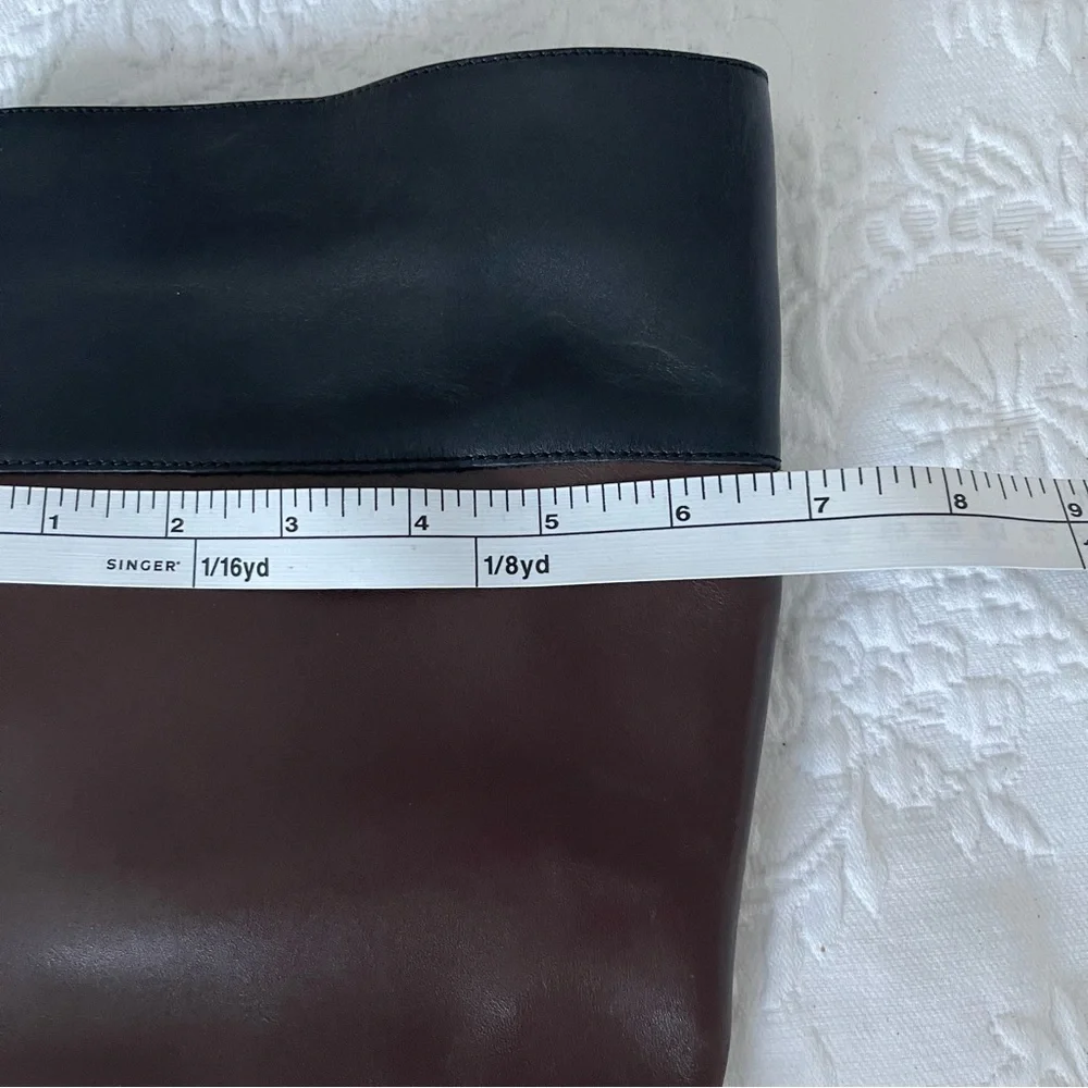 Michael Kors Black and Brown Leather Knee Boots with Gold hardware. Size 6